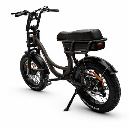 Molenstraat Fatbikes MOOI electric bike in Deep Coffee with fat tires, rear suspension, and a quilted black seat.