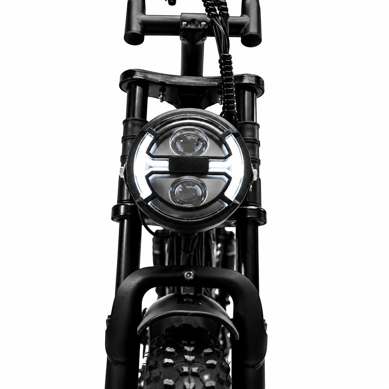 Molenstraat Fatbikes STORM electric fatbike front view featuring a bright circular LED headlight and suspension forks