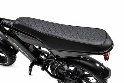 Molenstraat Fatbikes STORM electric bike featuring a black quilted leather bench seat and rear suspension